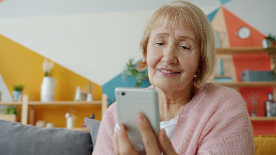 An older lady smiling at her phone during her morning call